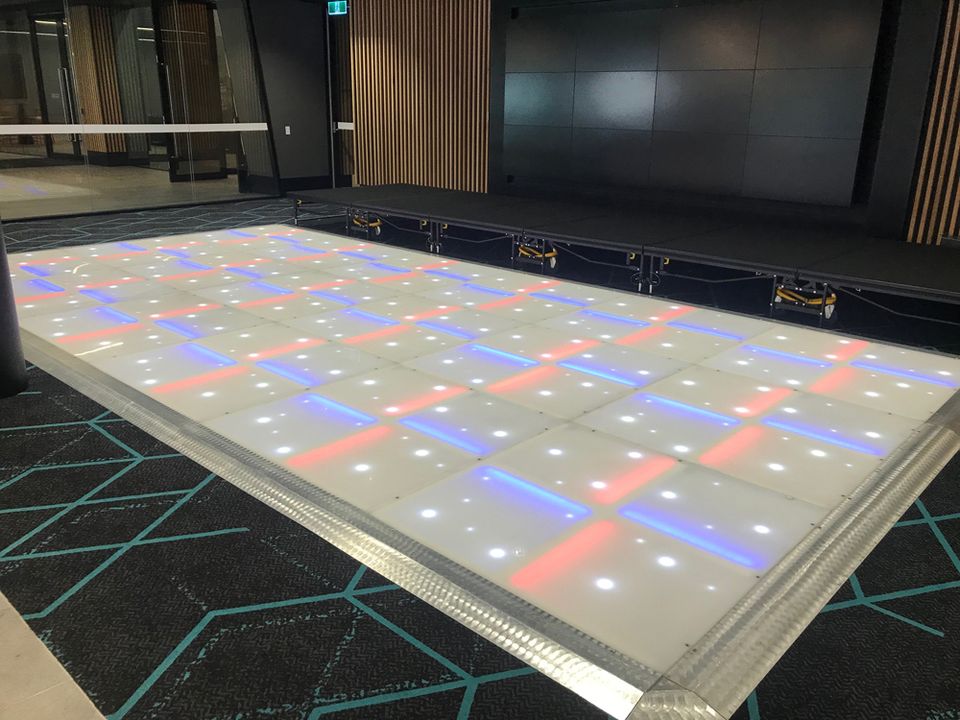 LED dance floor showing mixed colours in a function room