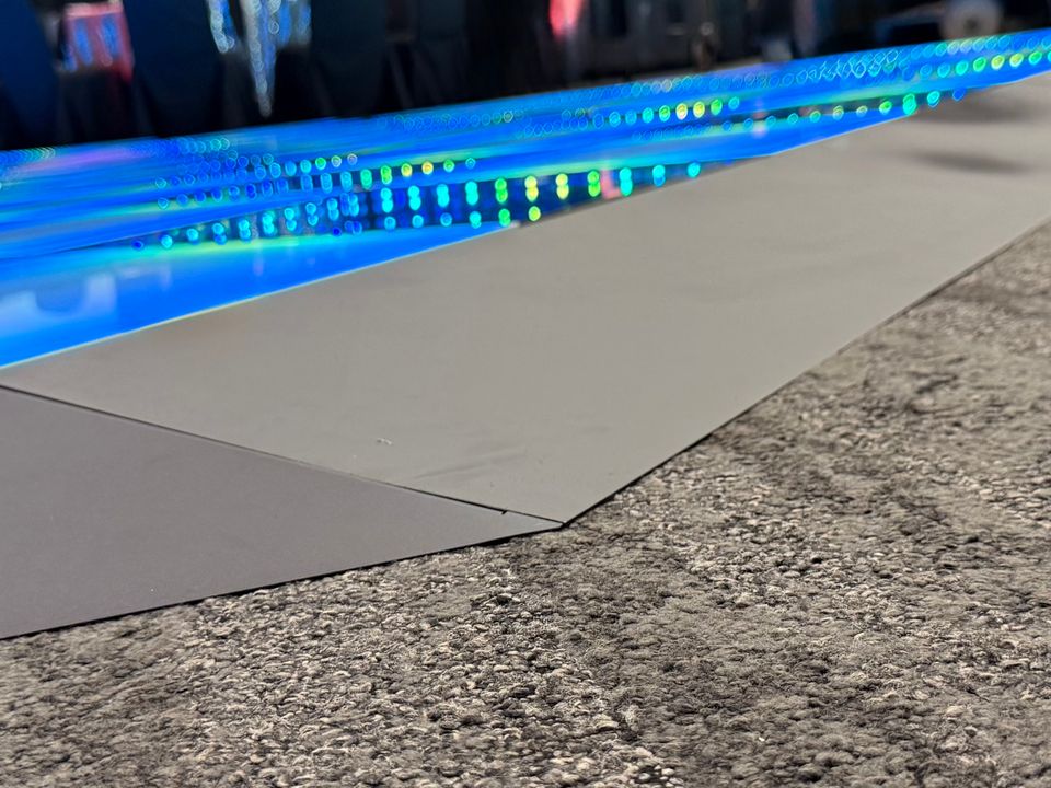 Sloped edging along the side of the LED dance floor