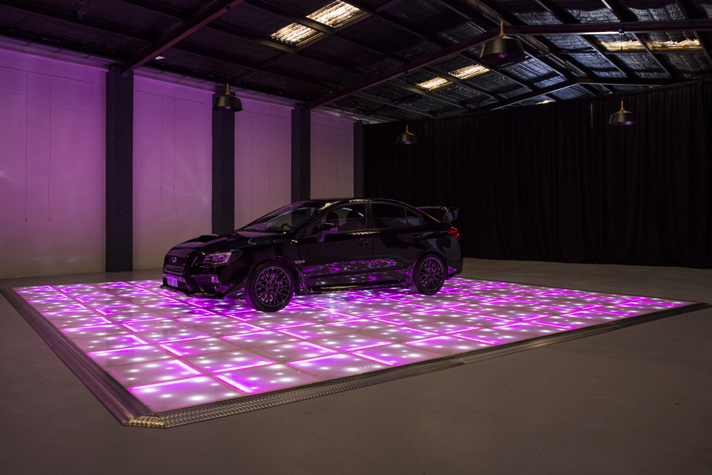 Pink LED with stars displaying car