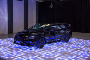 Car on LED dance floor