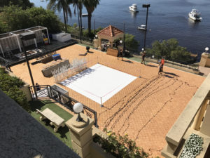 Parquetry dance floor on tennis court