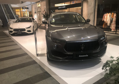 White display floor under Maserati cars