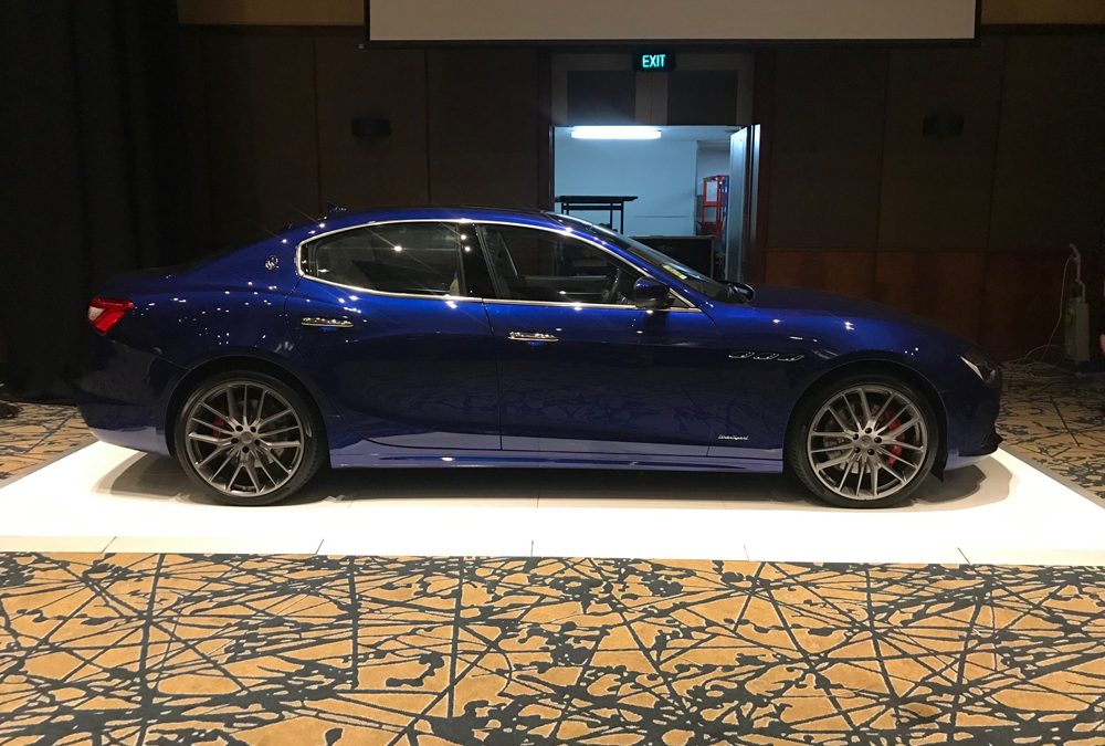 White gloss dance floor for Maserati car