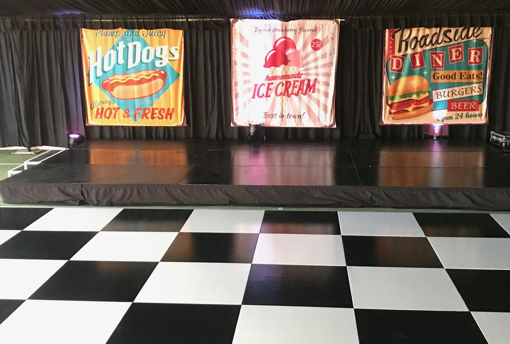 Dance floor for themed event inside a marquee