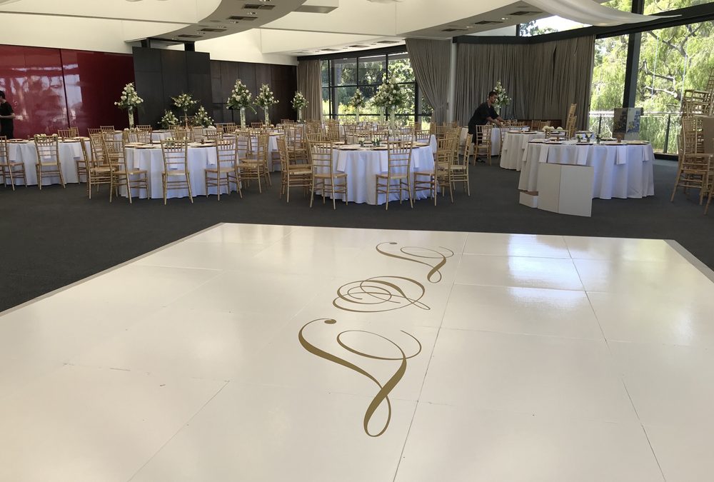 White gloss dance floor with monogram